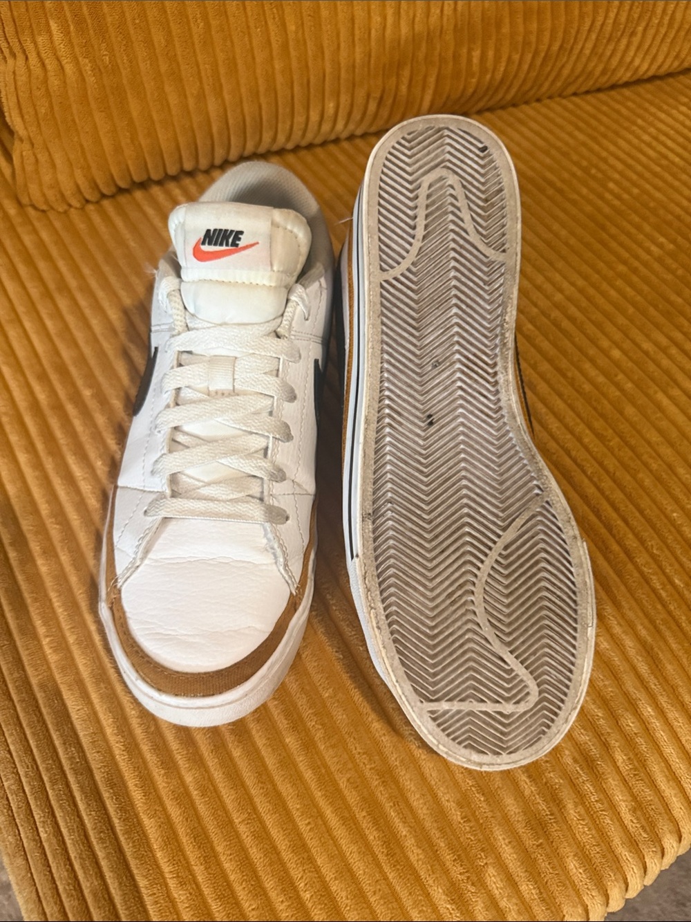 Nike Women’s White Sneakers with Black Swoosh and Brown Accents